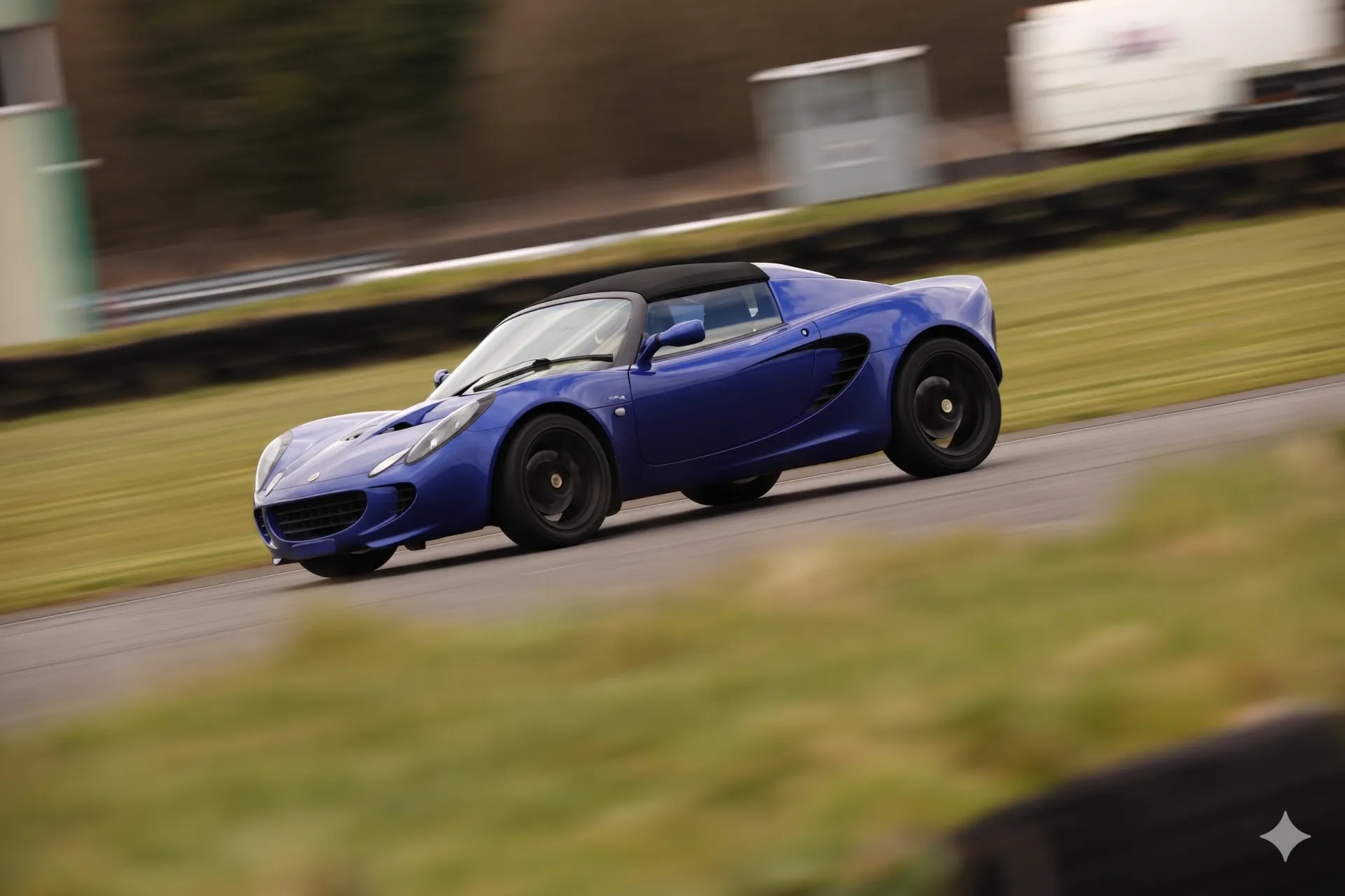 Blue Lotus Elise on race track